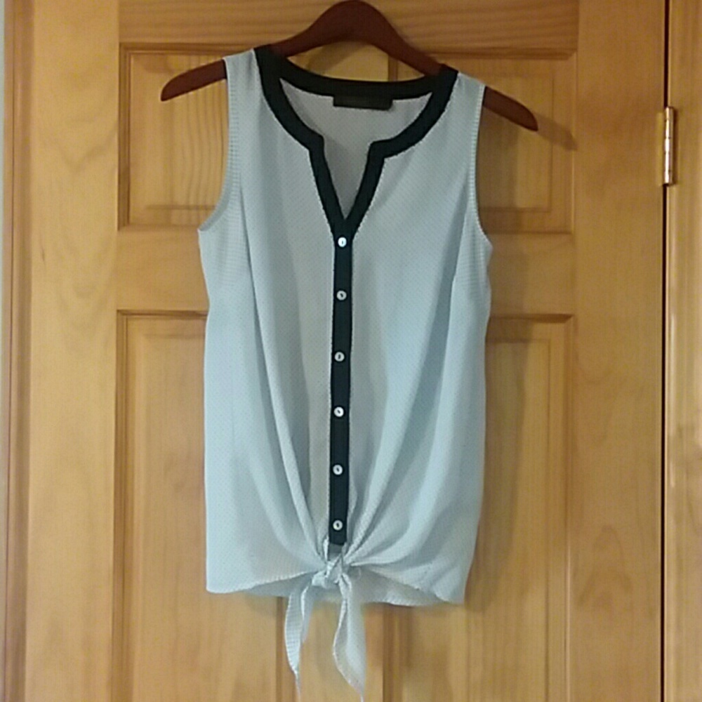Sleeveless polka dot button up blouse